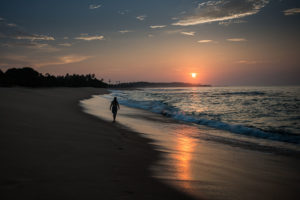sunrise-woman-walk-stroll-shore
